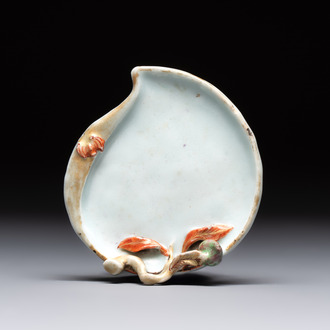 A Chinese iron-red gilt-decorated celadon-glazed peach-shaped brushwasher, 18th C.