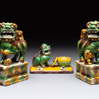 A pair of Chinese sancai-glazed Buddhist lions and an inkwell, 19th C.