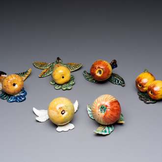 A collection of six polychrome Dutch Delft hanging fruits, 18th C.