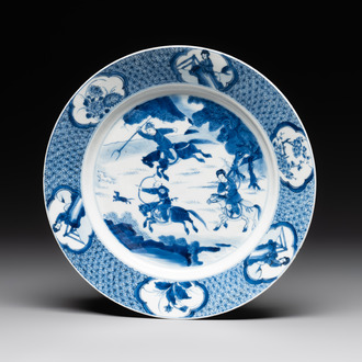 A Chinese blue and white 'rabbit hunt' dish, Chenghua mark, Kangxi