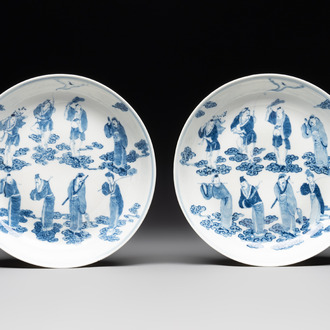 A pair of Chinese blue and white 'Eight Immortals' plates, Kangxi mark, 19th C.