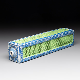 A Chinese blue- and green-enamelled reticulated incense stick holder, 19th C.