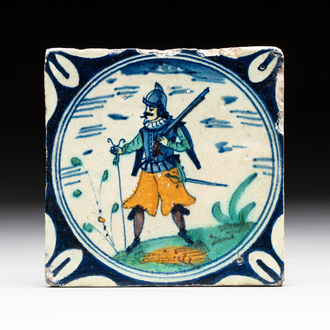 A polychrome Dutch Delft maiolica 'medallion' 'soldier' tile, late 16th C.