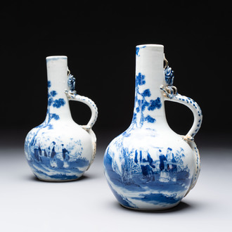 A pair of Chinese blue and white wine jugs with a chilong-form handle, possibly for the Vietnamese market, 19th C.