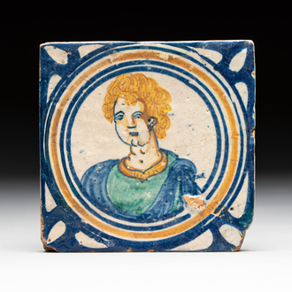 A polychrome Dutch Delft maiolica 'medallion' 'portrait' tile, late 16th C.