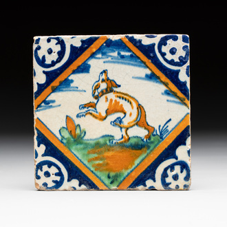 A polychrome Dutch Delft maiolica 'dog' tile, late 16th C.