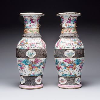 A pair of Chinese Nanking famille rose vases with narrative design, 19th C.