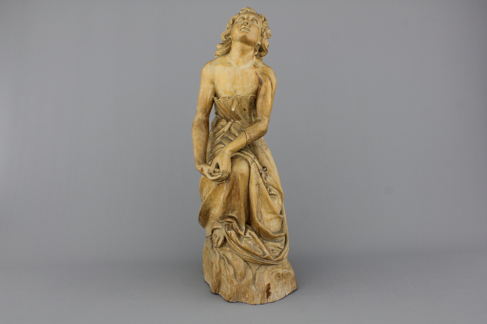 A large carved wood figure of a kneeling lady, ca. 1800