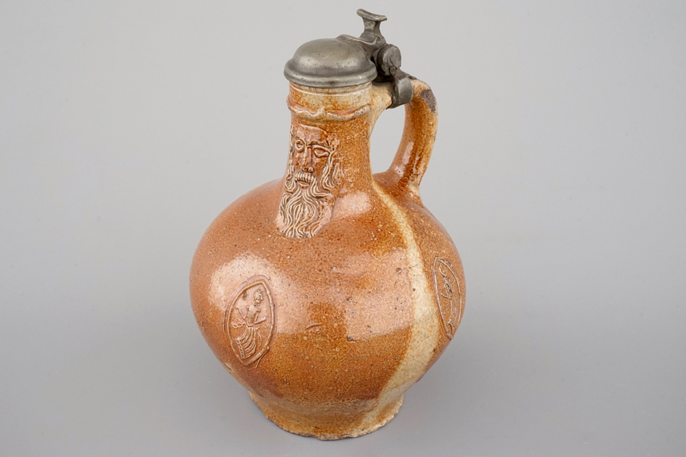 A fine beardman's or bellarmine jug with pewter cover, Raeren, late 16th C.