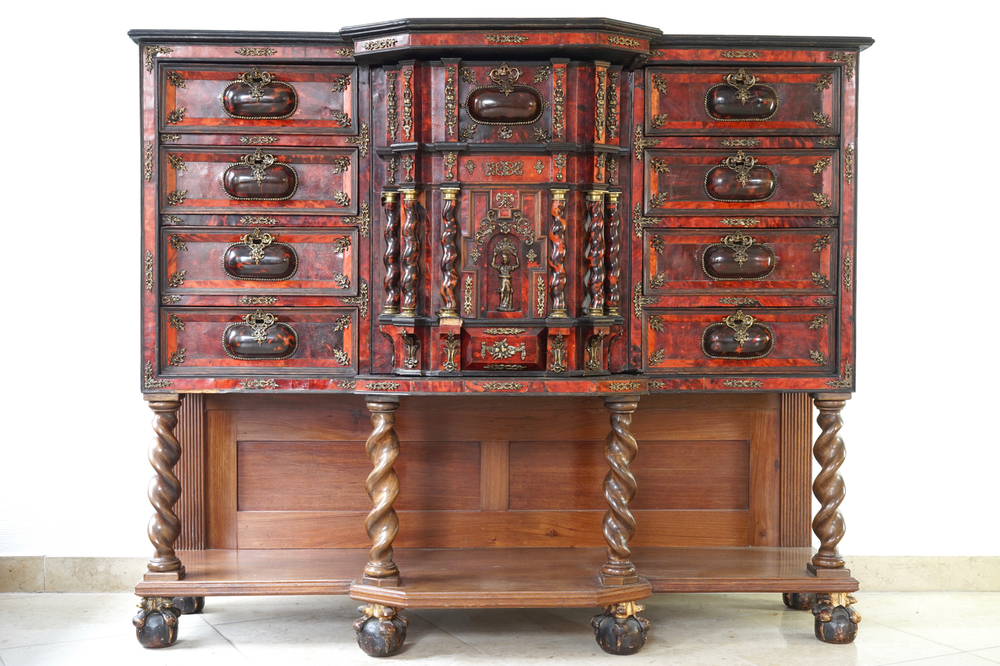 A baroque cabinet with walnut and tortoise shell veneer, partly 17/18th C.