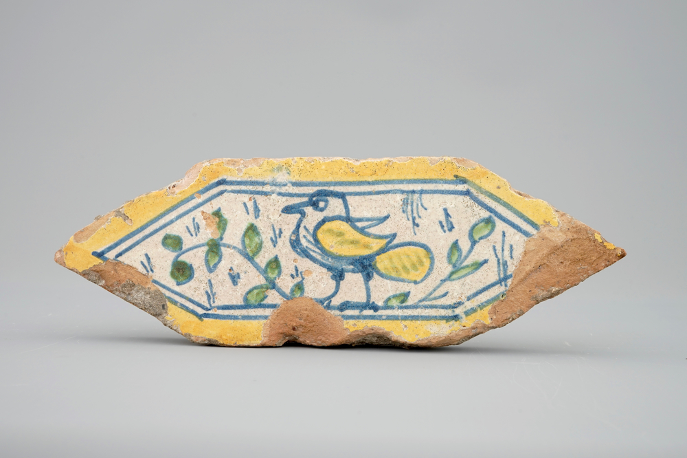 A hexagonal Italian tile with a bird, 16th C.