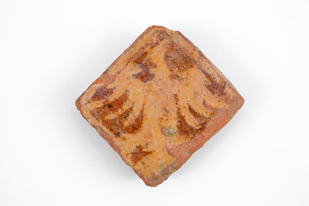 A medieval tile with an eagle, probably Flemish, 14th C.