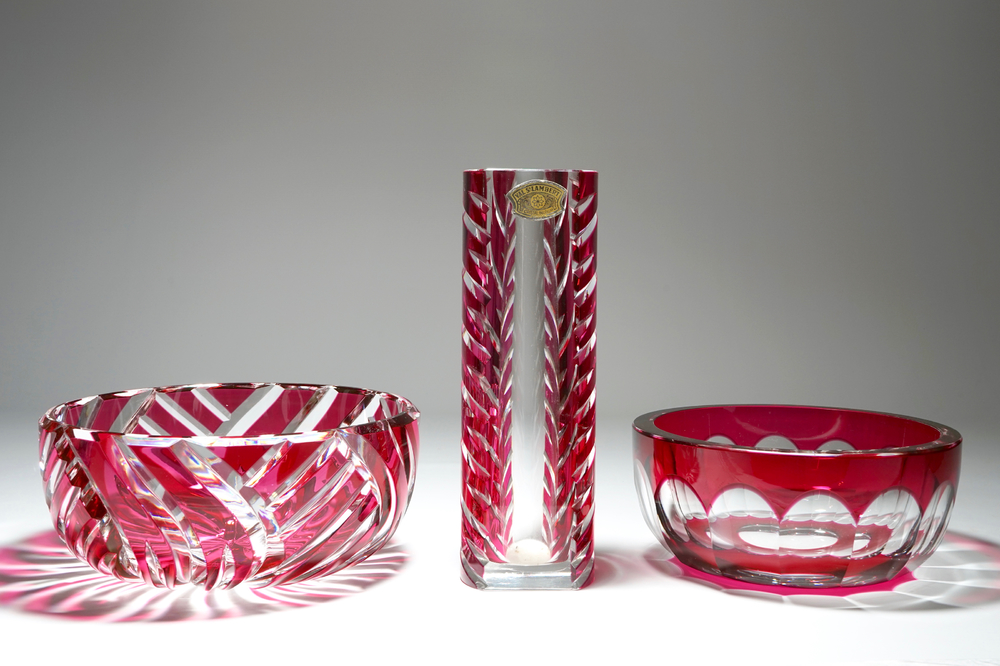 Two Val-Saint-Lambert crystal bowls and a vase in ruby pink crystal, 20th C.
