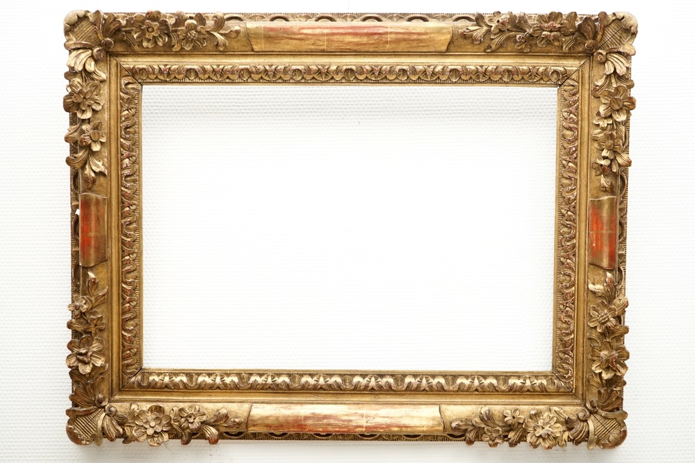 A sculpted gilt wood frame, 19th C.