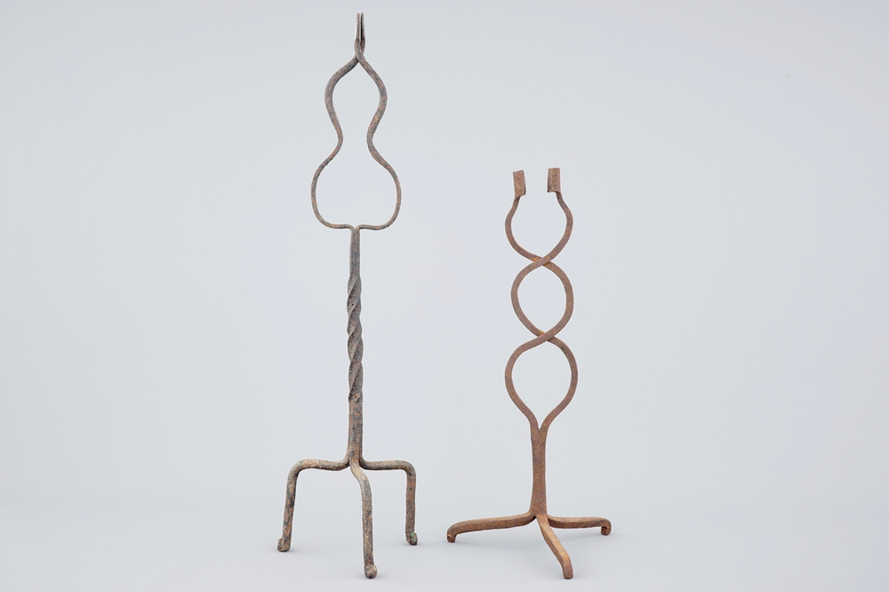 Two large wrought iron candlesticks, 17th C.