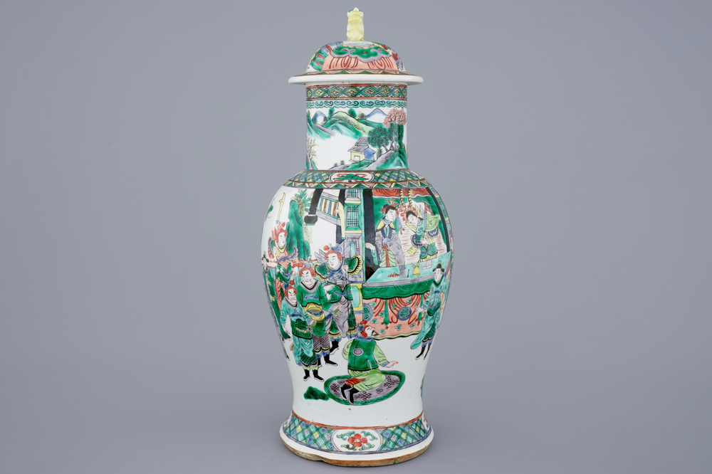 A Chinese famille verte vase and cover with a court scene, 19th C.