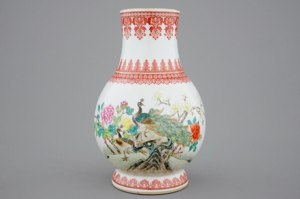 A Chinese Republic famille rose vase with a peacock, 20th C.