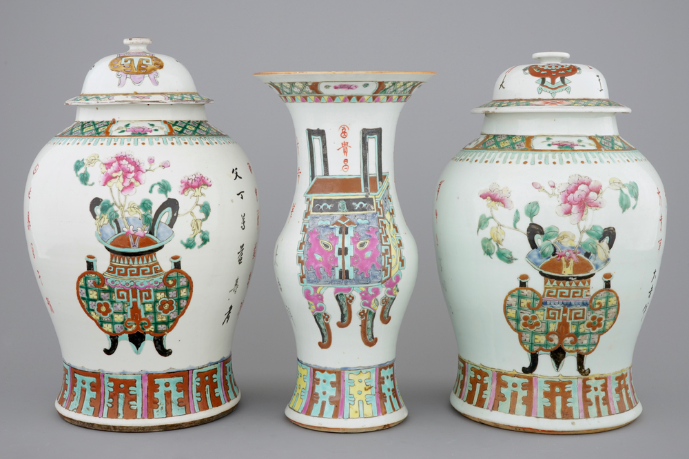 A set of three Chinese famille rose vases, 19th C.