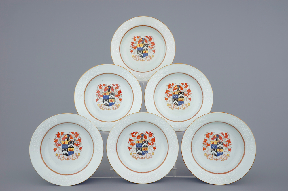 A set of six Chinese export porcelain armorial plates with bianco sopra bianco design, Qianlong, 18th C.