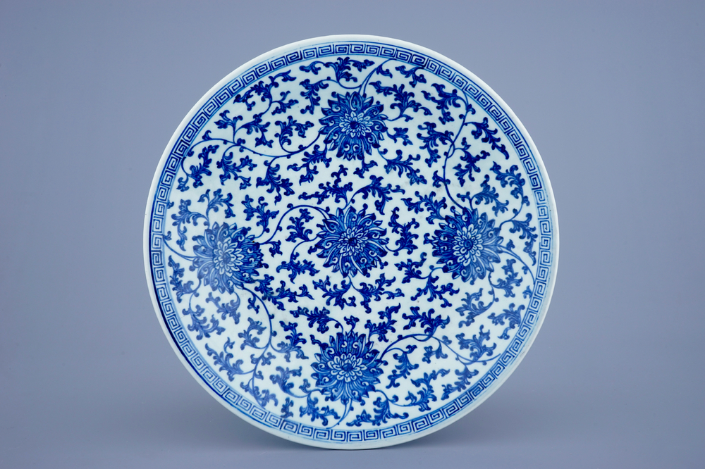 A large blue and white lotus scroll dish, Qianlong mark and of the period