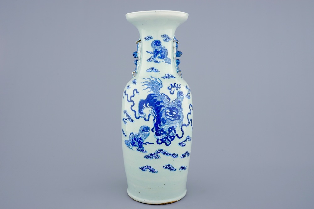 A Chinese blue and white on celadon ground porcelain vase with foo dogs, 19th C.