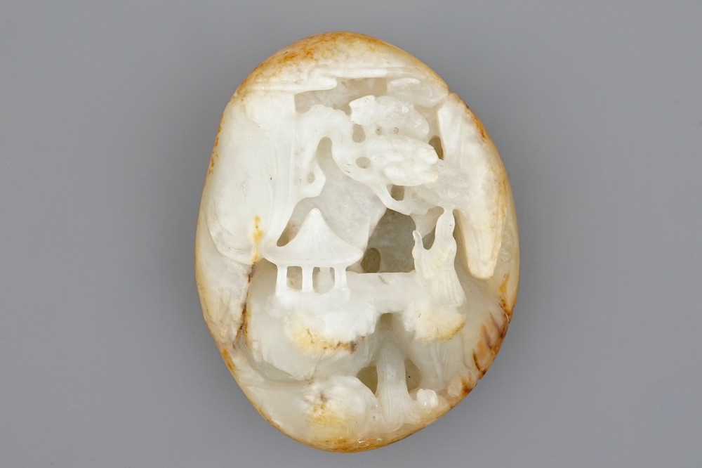 A Chinese miniature carved jade boulder, 19/20th C.