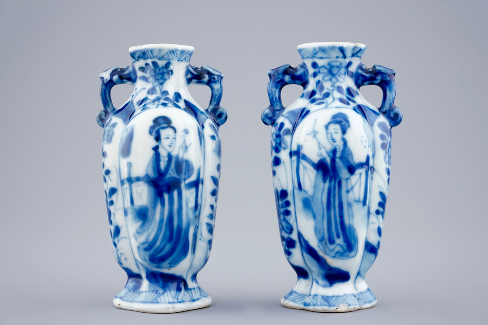 A pair of small Chinese blue and white vases with long Elizas, Kangxi