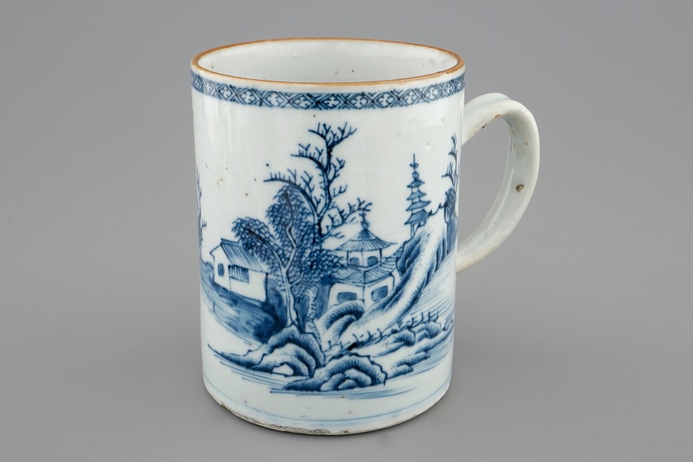 A Chinese famille rose eggshell cup, Yongzheng, and a blue and white beer mug, Qianlong