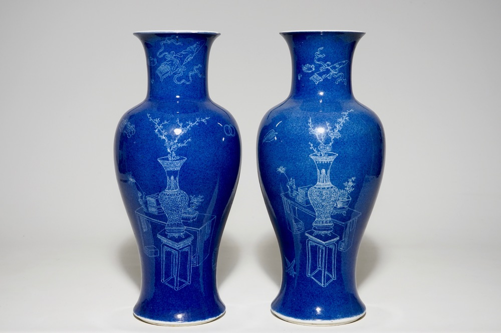 A pair of Chinese powder blue ground vases with incised decoration, 19th C.