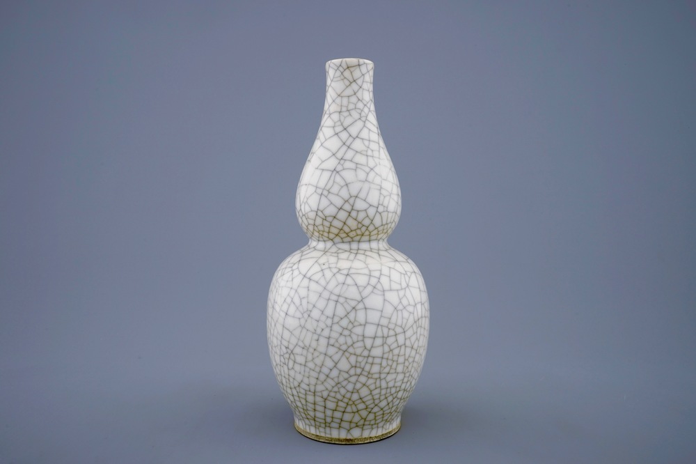 A Chinese monochrome crackle glazed double gourd vase, 19th C.