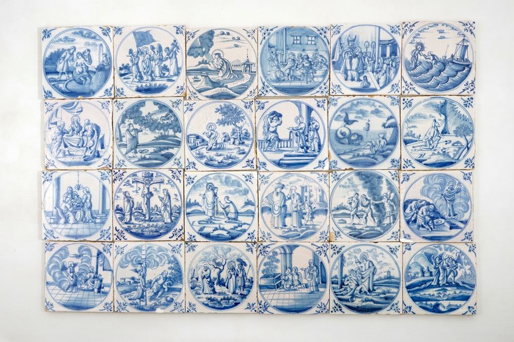 A set of 24 Dutch Delft blue and white biblical tiles, 18th C.