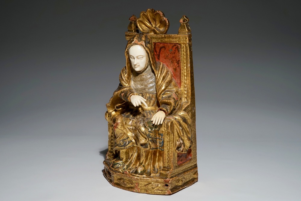 A gilt and painted wooden and ivory figure of the seated Saint Anne, Southern Europe, 17/18th C.