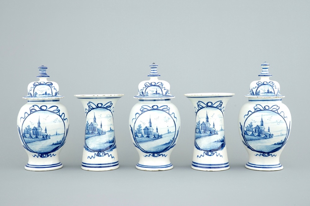 A Dutch Delft five-piece vase garniture with landscape scenes, 18th C.