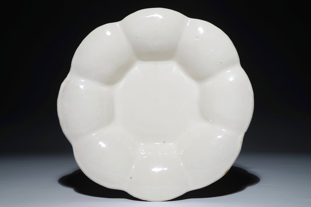 A white Dutch Delft gadrooned dish, 17th C.