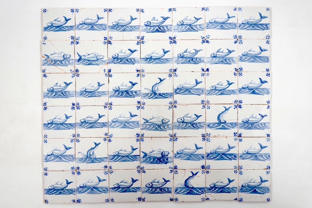 A set of 47 Dutch Delft blue and white seacreature tiles, Pulinckx workshop, Bruges, 18th C.