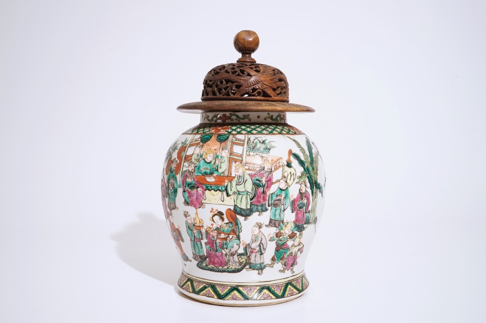 A Chinese famille rose warriors jar with wooden cover, 19th C.