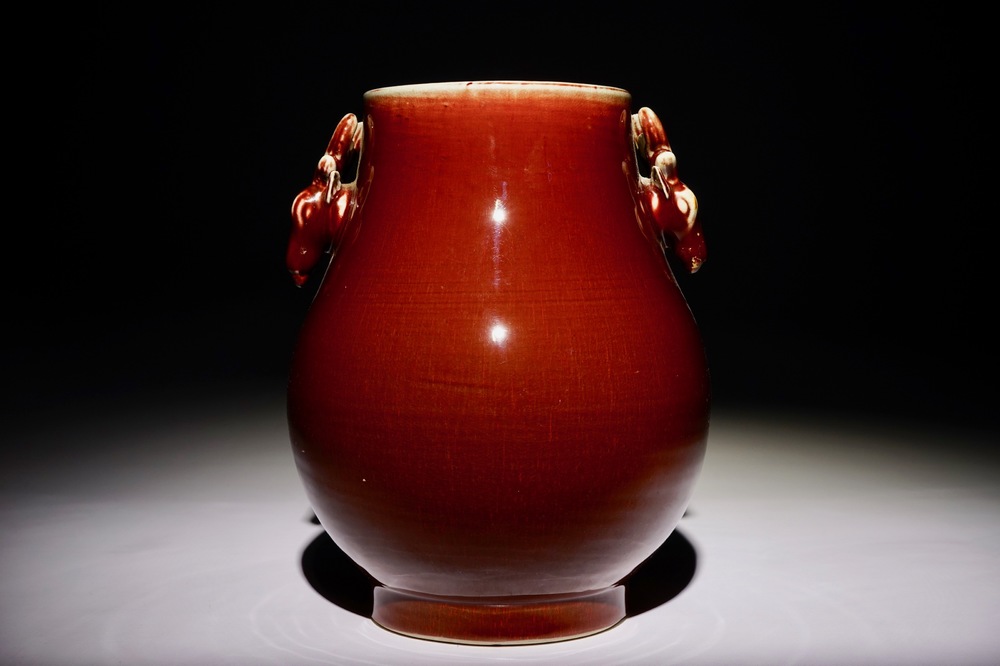 A Chinese monochrome sang-de-boeuf-glazed deer-handled hu vase, 19th C.