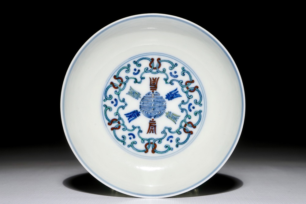 A Chinese doucai saucer plate with Shou-characters, Yongzheng mark, 19/20th C.