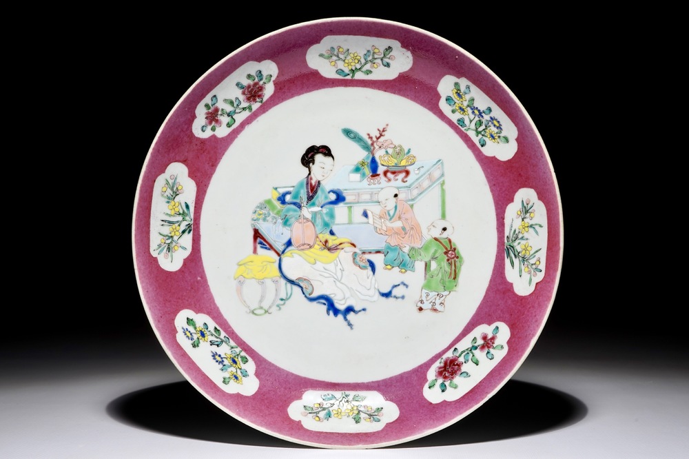 A Chinese famille rose ruby-ground plate, Yongzheng