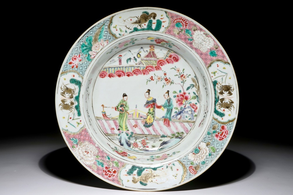 A deep Chinese famille rose plate with figures on a bridge, Yongzheng