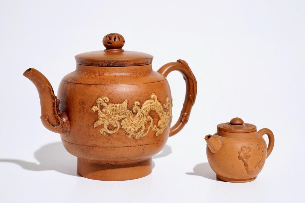 https://www.rm-auctions.com/images/thumbnails/width/1000/2017/08/23/e64cdb2/two-chinese-yixing-teapots-with-relief-design-kangxi-and-later-1.jpg