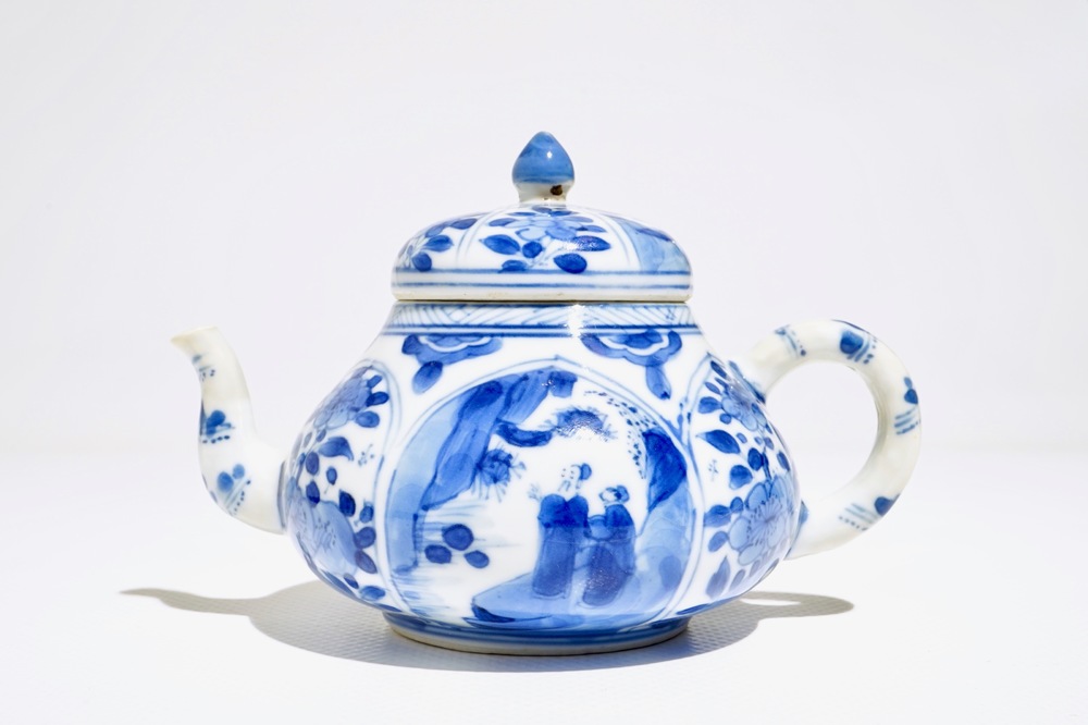 A Chinese blue and white teapot with figurative and floral panels, Kangxi