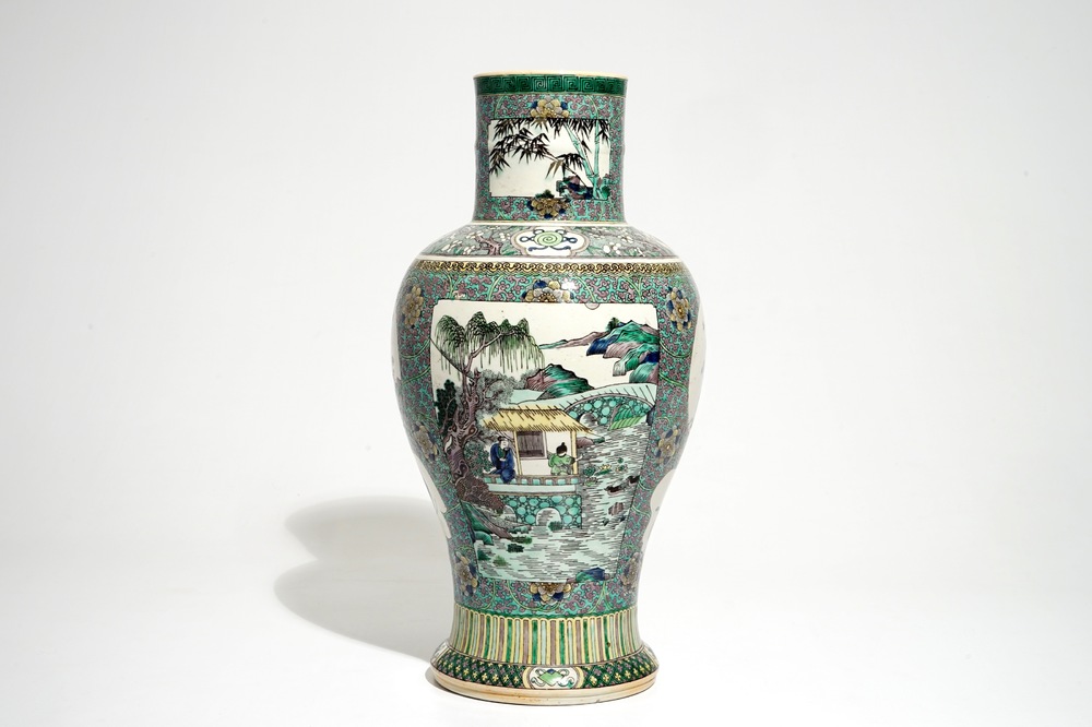 A Chinese verte enamel on biscuit vase with a fluvial landscape, Kangxi