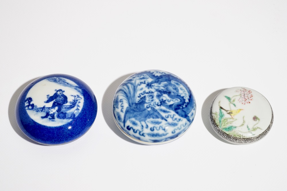 Three Chinese blue and white and famille rose circular boxes and covers, 19/20th C.