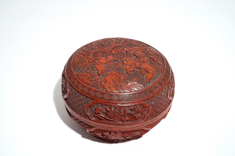 A Chinese cinnabar lacquer box and cover with playing boys, 19th C.