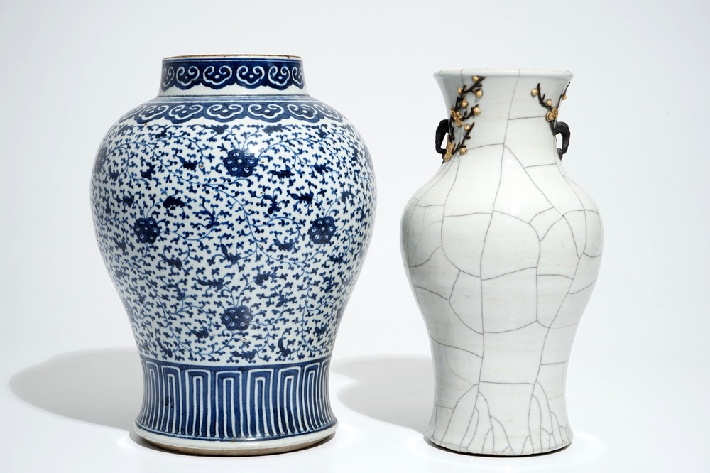 A Chinese crackle-glazed vase and a blue and white lotus scroll baluster jar, 19th C.