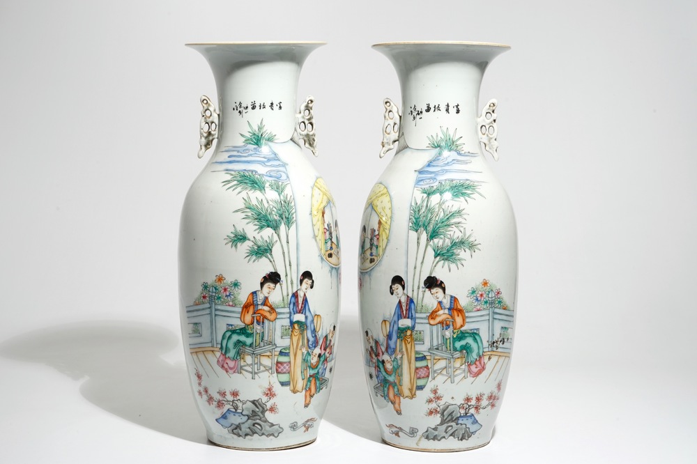 A pair of tall Chinese famille rose vases with figural design and calligraphy, 19/20th C.