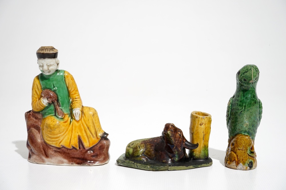 Two Chinese verte biscuit joss stick holders and a model of a parrot, Kangxi