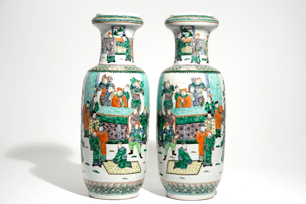 A pair of tall Chinese famille verte vases with court scenes, 19th C.