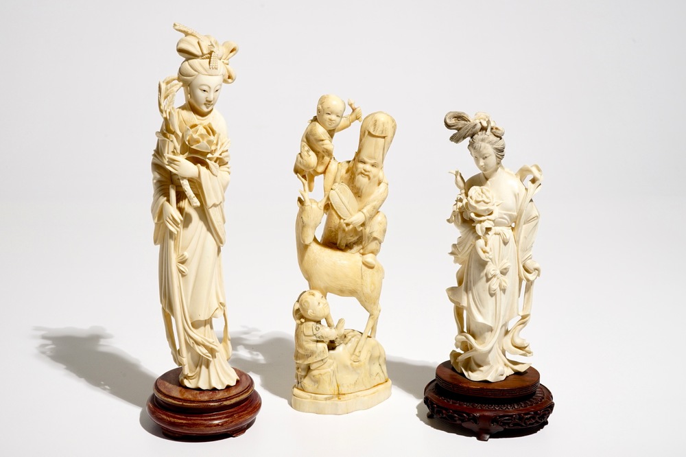 Two Chinese carved ivory figures of Guanyin and a Japanese okimono, 19/20th C.